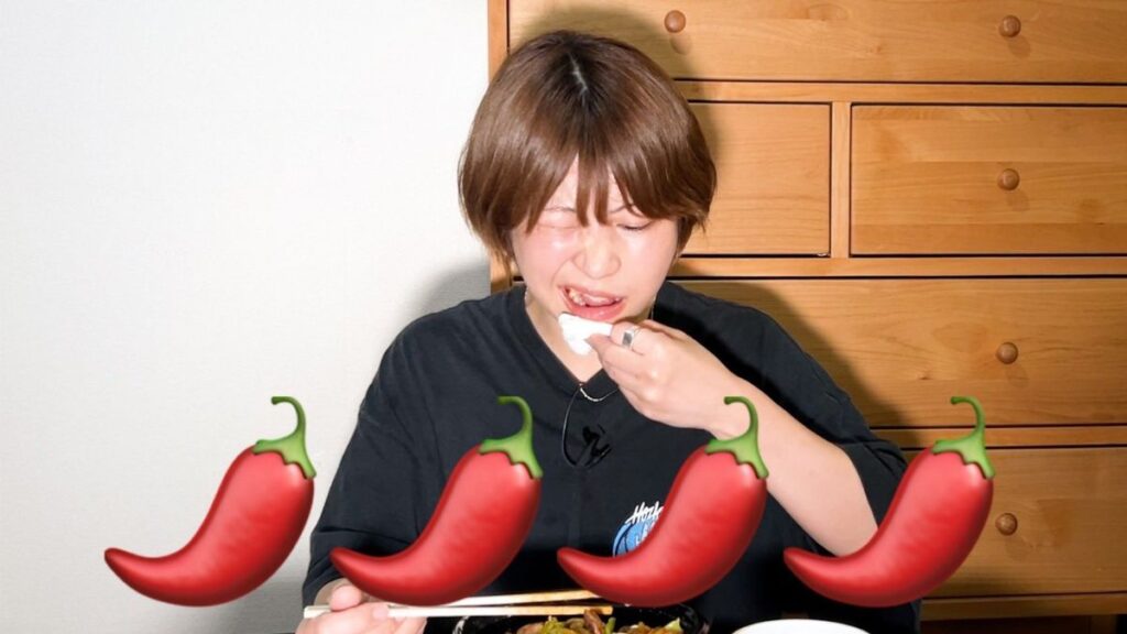 辛そうな顔をする加納