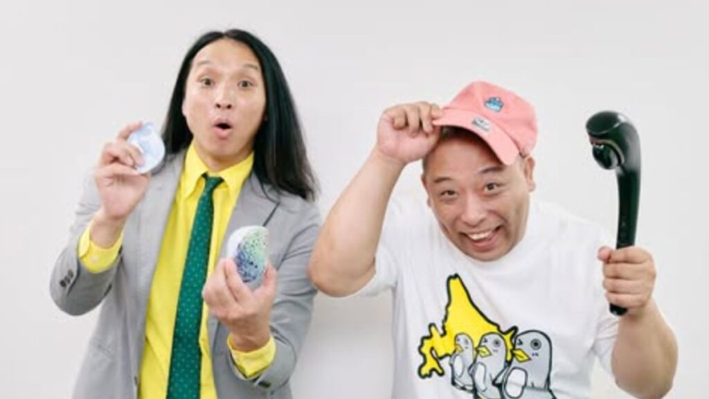 驚いた顔をする布川と帽子をかぶりわらうみちお